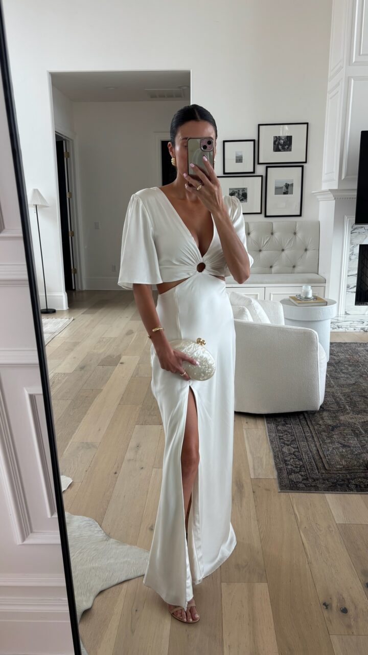 Christine Andrew in a white formal dress from Abercrombie