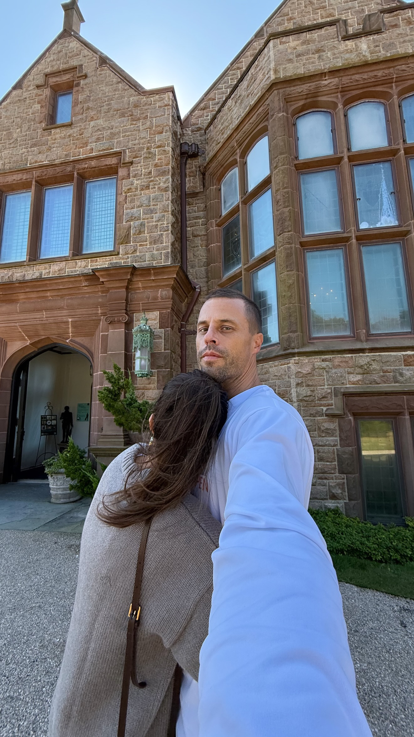 Christine and Cody Andrew in fall outfits on a trip to Newport, Rhode Island